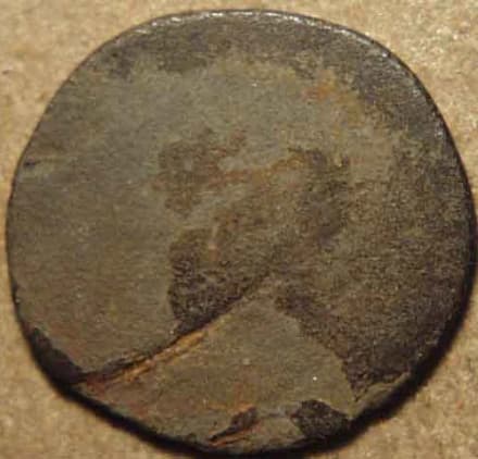 Anepigraphic flower-type uniface potin unit - Copper reverse